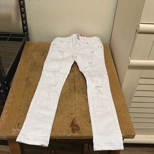 Girls white ripped jeans